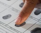 Казахстан может собрать отпечатки пальцев у всех граждан